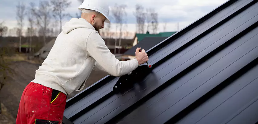 Tin Roof Ridge Cap Installation in Renton